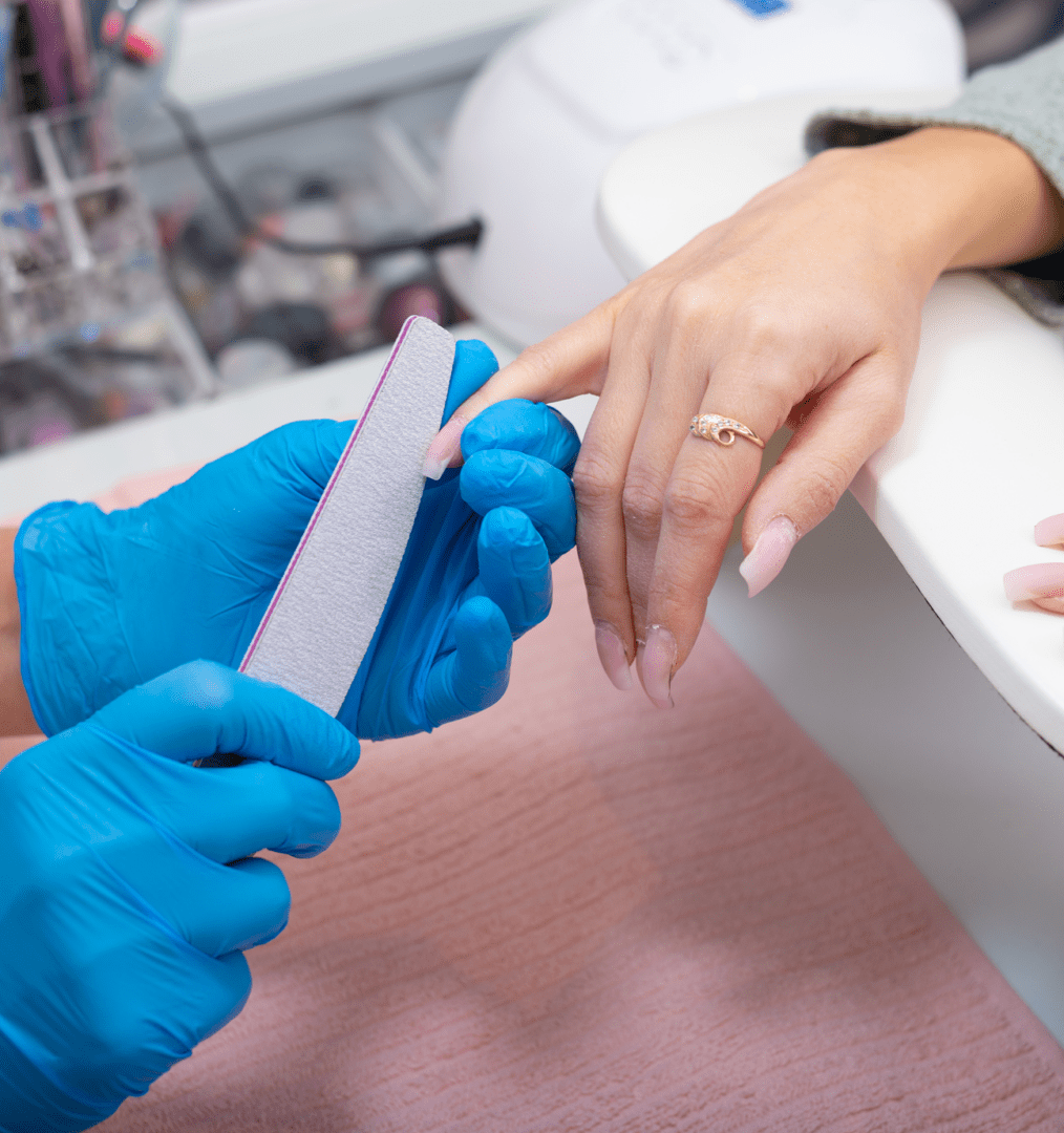 Hand receiving professional nail care