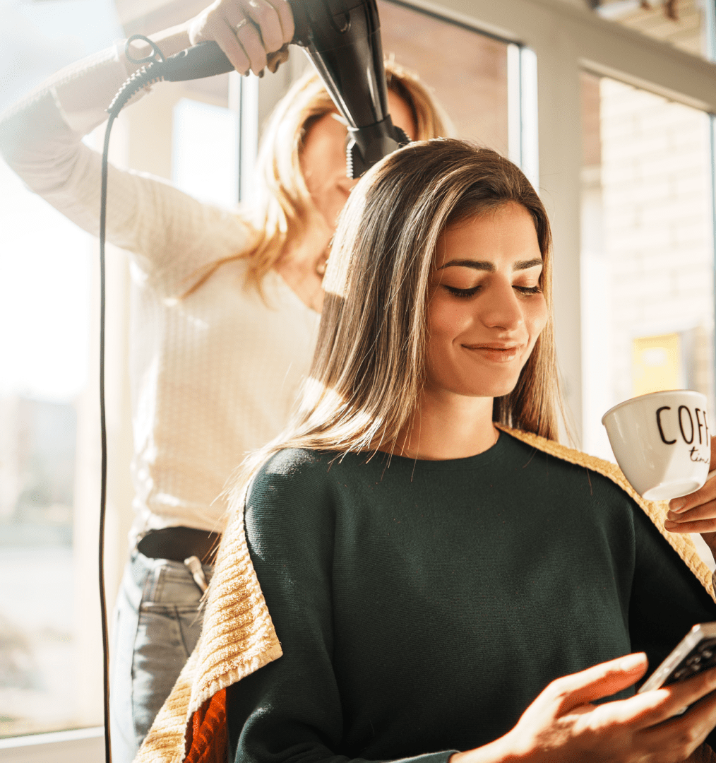 Relaxed woman at salon with coffee