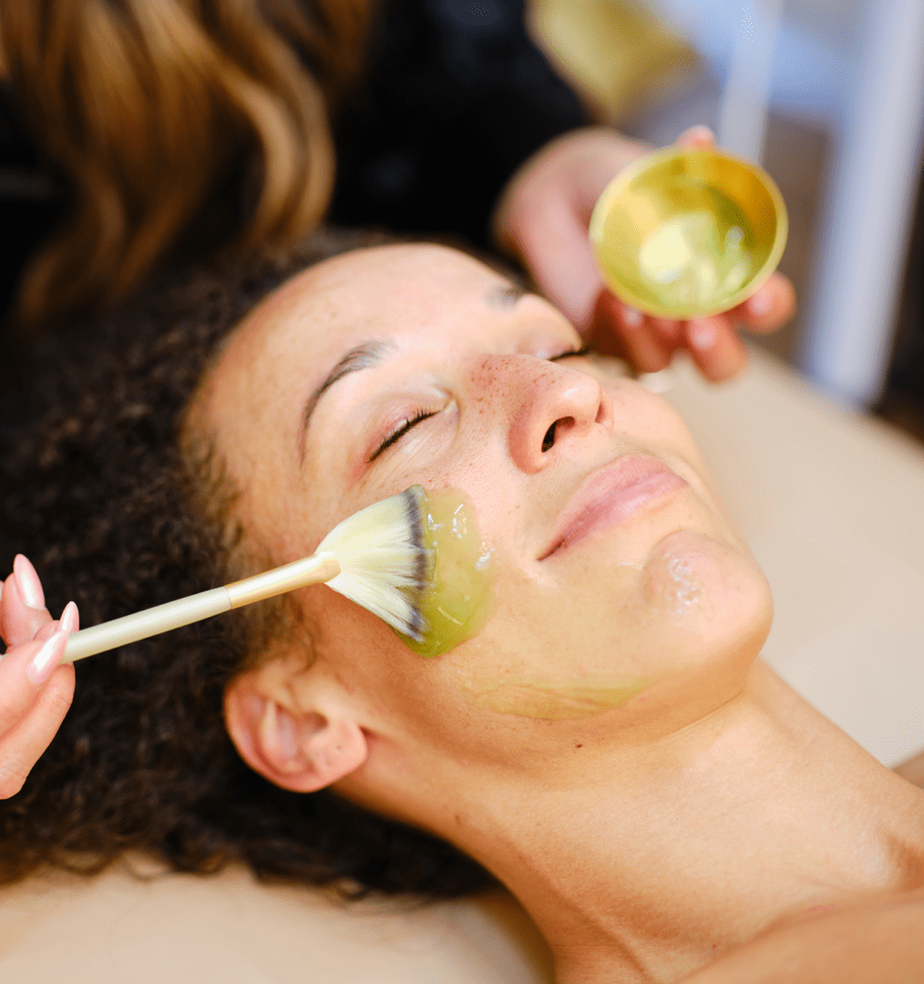 Facial mask application at a spa