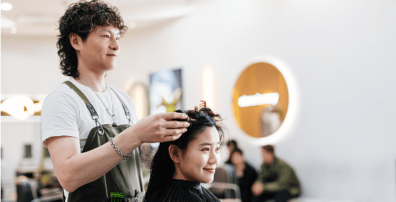 Professional haircut session in progress